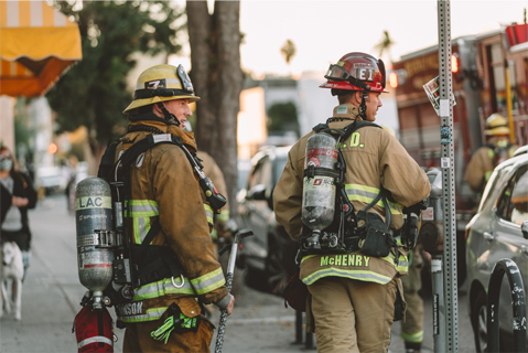 firemen wear dosimeters to monitor radiation exposure